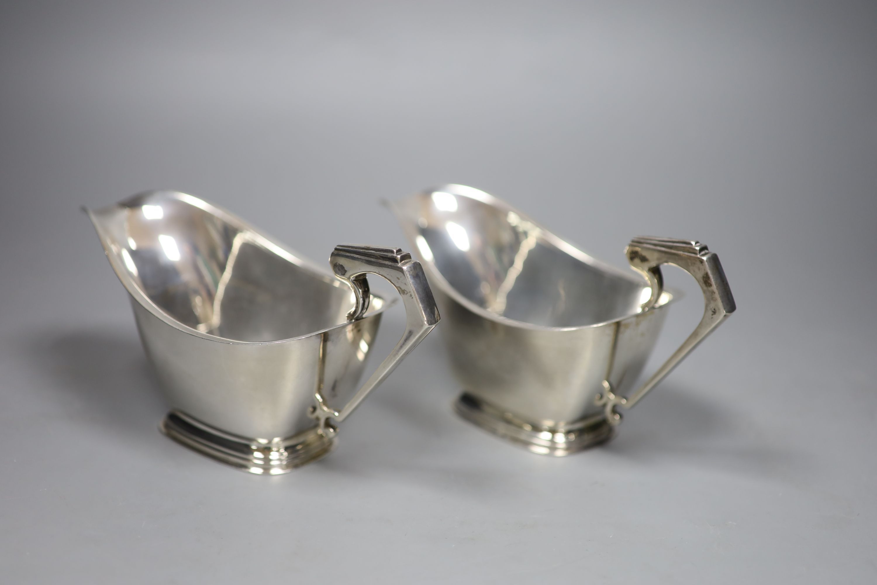 A pair of silver sauce boats, william Neale Ltd, Birmingham, 1935, 12oz.